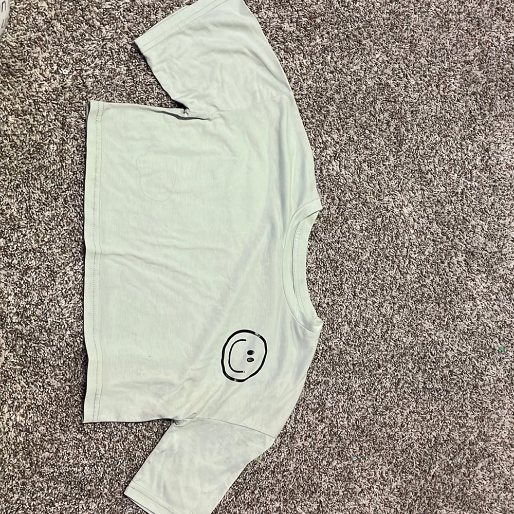 light green smiley shirt